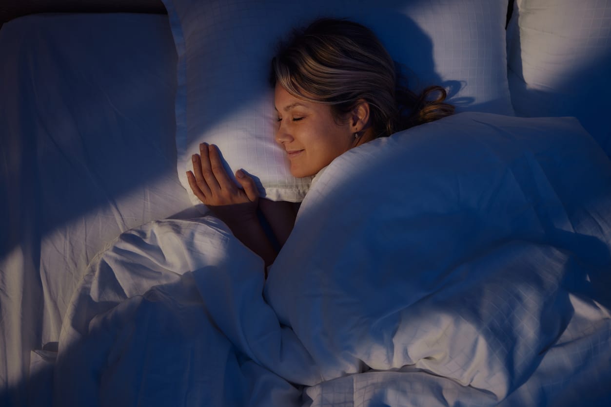 Woman sleeping in bed