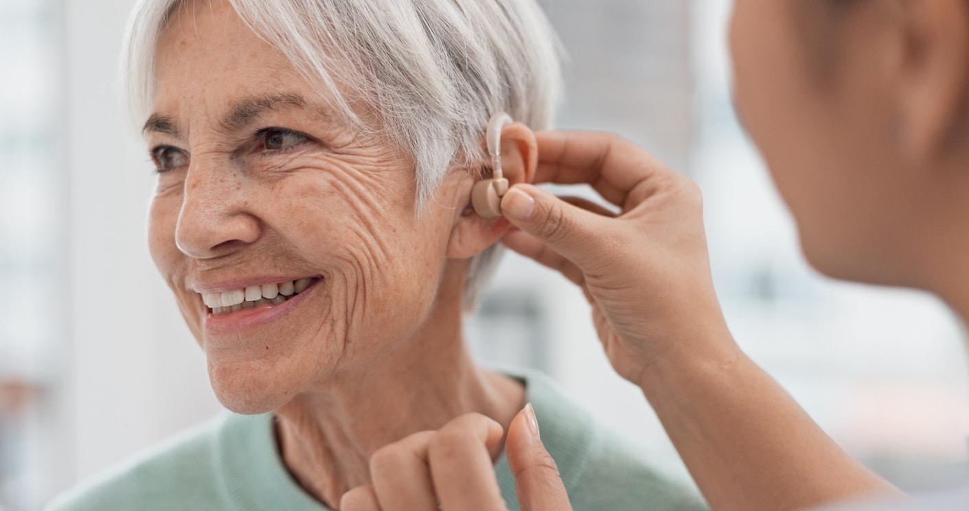 Woman gets fitted with hearing aid 