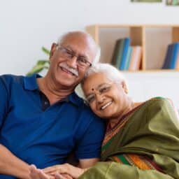 Happy older couple maintaining their balance.